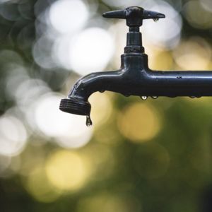 Water tap - Photo by Luis Tosta on Unsplash